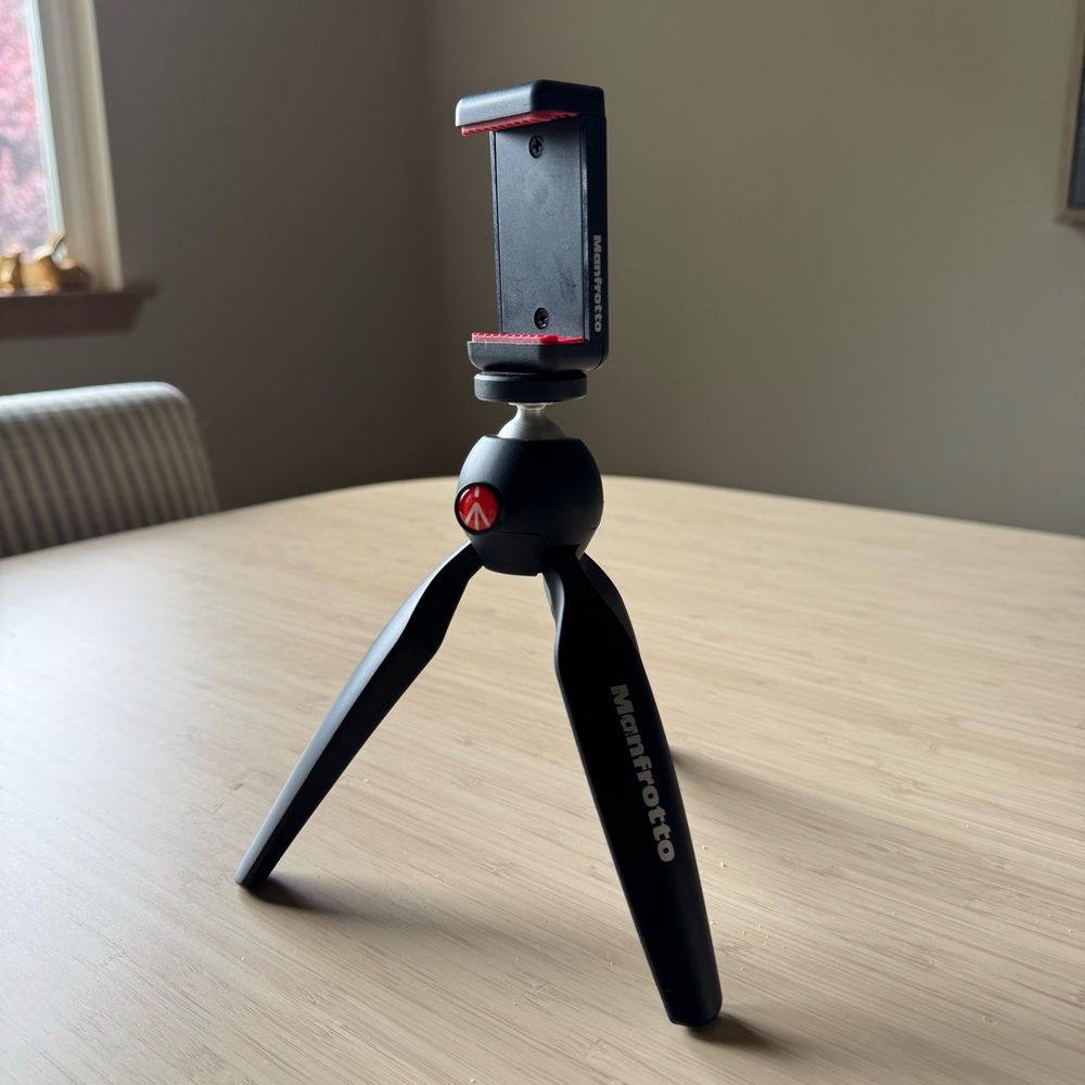 Manfrotto PIXI mini tripod with universal phone smartphone clamp